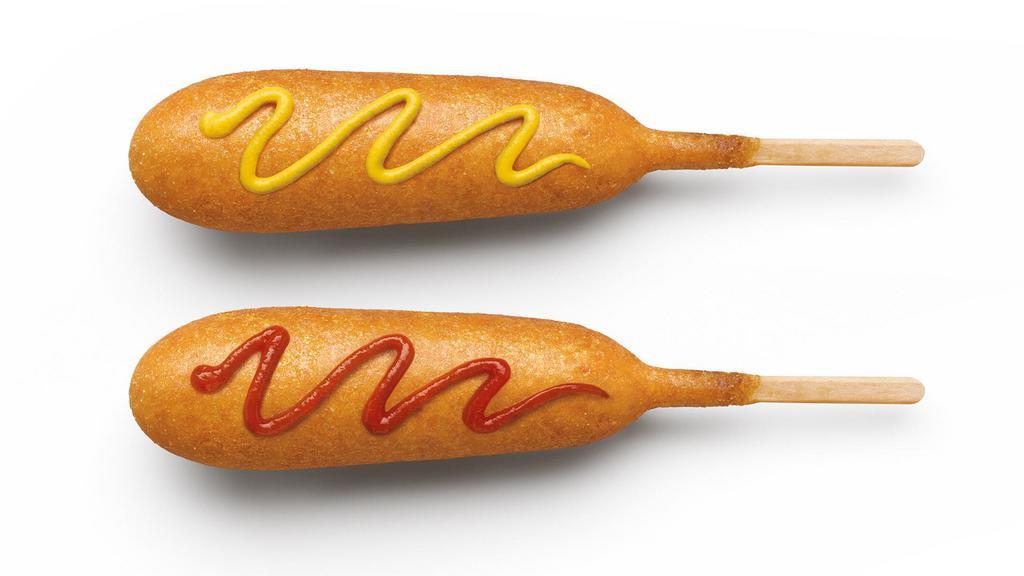 Corn Dog · A delicious hot dog surrounded in sweet corn batter and fried to a crispy golden brown. Try it with some mustard or ketchup if you want. It's like hot dog utopia on a stick.