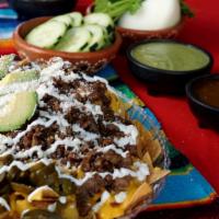 Nachos With Meat · Homemade Chips, Nacho Cheese,Meat Choice,mexican sour Cream,Jalapenos