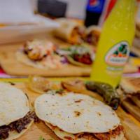 Mulitas · 2 Handmade Tortillas
Cheese
and meat Choice