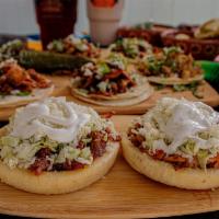 2 Sopes Combo · 2 Sopes, choice of meat, rice ,beans & a drink