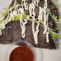 Fish Tacos (3) / Tacos De Pescado (3)  · Purple corn fried tortilla, sea bass, lettuce, guacamole, sour cream, salsa, pico de gallo. ...
