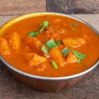 Chicken Vindaloo · Premium chicken cooked with potato & vinegar in Himalayan sauce, herbs, and spices.