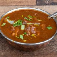 Lamb Curry · Boneless lamb pieces cooked in Himalayan sauce with herbs and spices in authentic way. Glute...