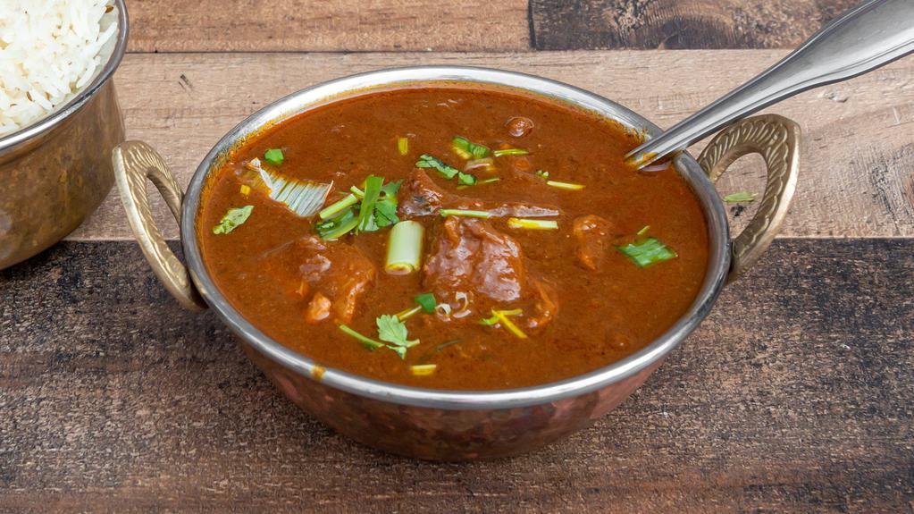 Lamb Curry · Boneless lamb pieces cooked in Himalayan sauce with herbs and spices in authentic way. Gluten-free.