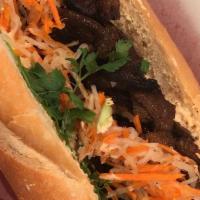Veganamese Banh-Mi Sandwich · PBP, pickled carrots and daikon, cucumbers, jalapeños, cilantro and spicy mayo on a light, c...