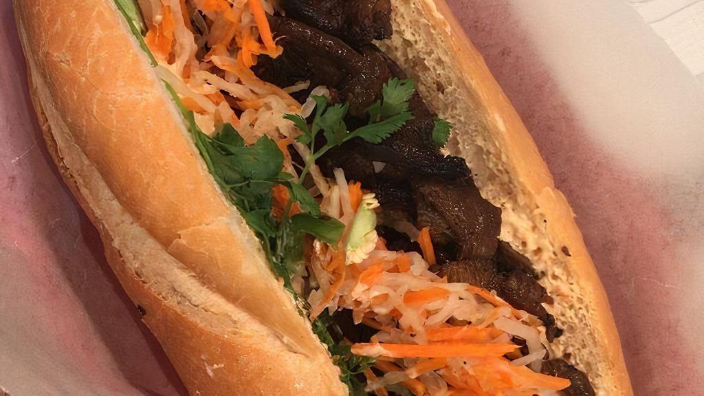 Veganamese Banh-Mi Sandwich · PBP, pickled carrots and daikon, cucumbers, jalapeños, cilantro and spicy mayo on a light, crusty roll. * 
 
*Plant-Based Protein