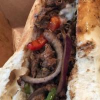Philly-Dilly Sandwich · Shredded beefsteak. American or pepper jack cheese. Peppers and onions on a hoagie roll.