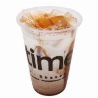 Iced Mocha · A rich and creamy mocha refreshment served with milk and ice along with shots of espresso.