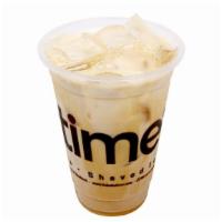 Iced Hazelnut Latte · Cool off with a rich latte made with milk, hazelnut syrup, and espresso served over ice.