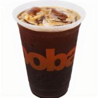 Iced Americano · A classic drink made using espresso shots topped with cold water and served over ice.