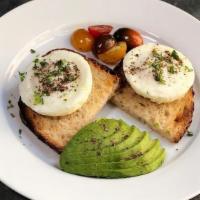 Poached Double On Toast · two poached eggs, heirloom cherry tomatoes, avocado, buttered sourdough toast