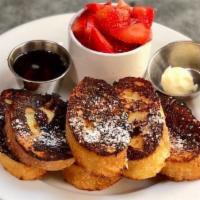 French Toast · berries, orange butter, maple syrup