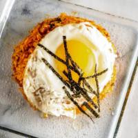Kimchi Fried Rice · Fried rice with kimchi and pork, topped with a fried egg.