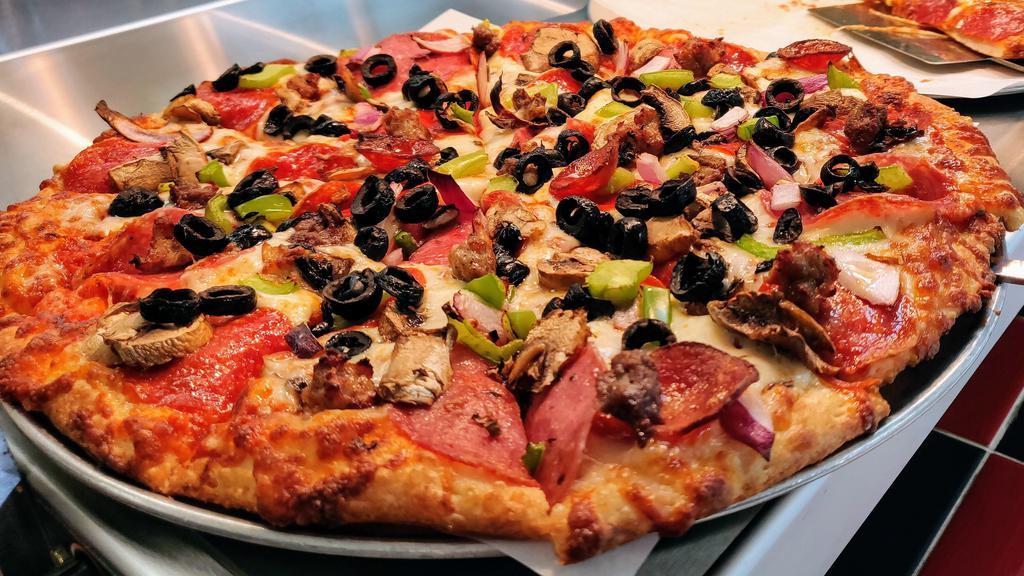 House Combination · Red tomato sauce, mozzarella cheese, salami, pepperoni, Italian sausage, ground beef, mushrooms, bell peppers, red onions, black olives.