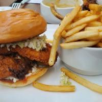 Nashville Hot Chicken Sandwich · Cole Slaw, Mayo, Pickles, French Fries.