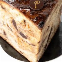 French Pudding · Our French pudding is made of croissant dough and filled with raisin, cinnamon, pecan and ca...
