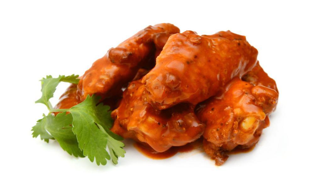 Buffalo Chicken Wings · Crispy chicken wings tossed in buffalo sauce.