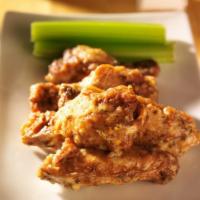 Chipotle Chicken Wings · Crispy chicken wings tossed in chipotle sauce.