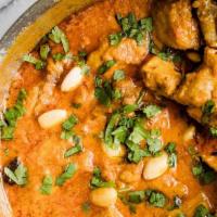 Chicken Korma · Mild curry with Chicken braised in a yogurt and seasoned with mild aromatic spices like card...