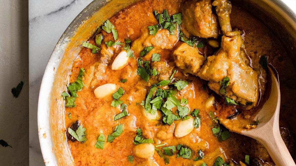 Chicken Korma · Mild curry with Chicken braised in a yogurt and seasoned with mild aromatic spices like cardamom, cumin, cinnamon, and coriander.