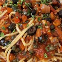 Spaghetti Alla Puttanesca · Sphagetti sauteed in fresh tomatoes, capres, garlic, black olives, and crushed chili.