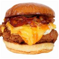 Egg N Bird Sandwich · Toasted Brioche Bun, Fried Chicken Strips, Bacon, Fried Egg, American Cheese, Hot Honey, and...