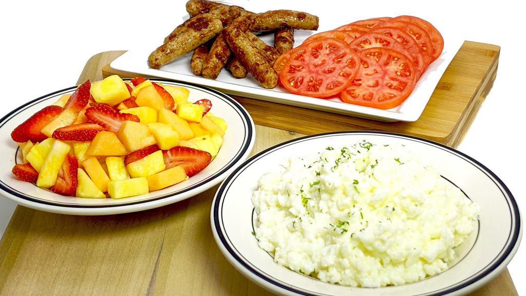 Healthy Breakfast (Serves 4) · Scrambled Egg whites, Turkey Sausage and freshly tomato slices.  Served with Seasonal Fruit Salad