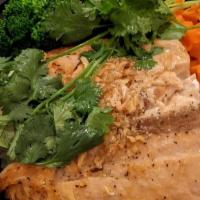 Salmon Bowl · Gluten free. Grilled garlic-salmon on jasmine rice, steamed broccoli and carrot top with cil...