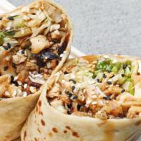 Thai Peanut Chicken Wrap · (Contains peanuts) - Grilled chicken, cilantro slaw, crushed peanuts, green onions, edamame,...