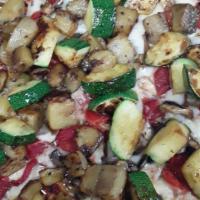 Grilled Vegetable Thick Crust Pizza · Grilled zucchini, eggplant, mushrooms, roasted garlic and peppers.