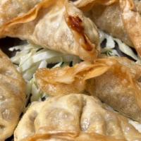 Gyoza (Pot Stickers) (6) · Beef and vegetables