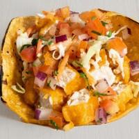 Baja Fish Taco Combo · Baja Fish topped with creamy Jalapeno slaw, cilantro, pico de gallo and a lime served on a w...