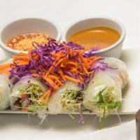 Fresh Veggie Spring Rolls · Stuffed With Tofu, Cucumber, Rice Noodles, And Mint. Served With Peanut Sauce and Plum Sauce.