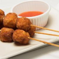 Shrimp Ball Skewers · Three skewers  of fried, seasoned shrimp meatballs. Served with sweet chili sauce.