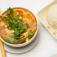 Tom Yum Soup · Hot and Sour Lemongrass Soup with Fresh Mushrooms, Green Onions and Cilantro