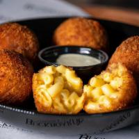 Mac & Cheese Balls · Five Deep Fried Balls of our Famous Mac and Cheese with Pasilla Pepper Dip.