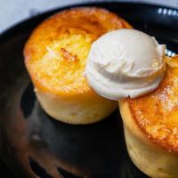 Cornbread With Maple Butter · Two Homemade Cornbread Muffins with a Sweet Maple Butter Topping.