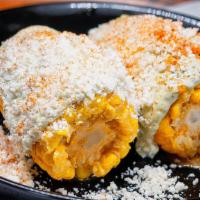 Street Corn · Mexican Street Corn with a Spicy Citrus Cilantro Aioli and Topped with Cotija Cheese. GF