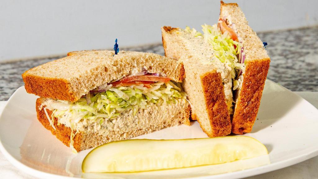 Tuna Salad · Mayo, mustard, Freshly cut lettuce, tomatoes and red onions on your choice of white, whole wheat, rye, or sourdough bread.