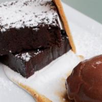 S'Mores · Flourless chocolate cake, toasted marshmallow & gluten-free graham cracker.