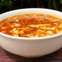 A18 Hot & Sour Soup (Xúp Chua Cay) · Spicy egg flour soup w/ pork, tofu & fungus strips