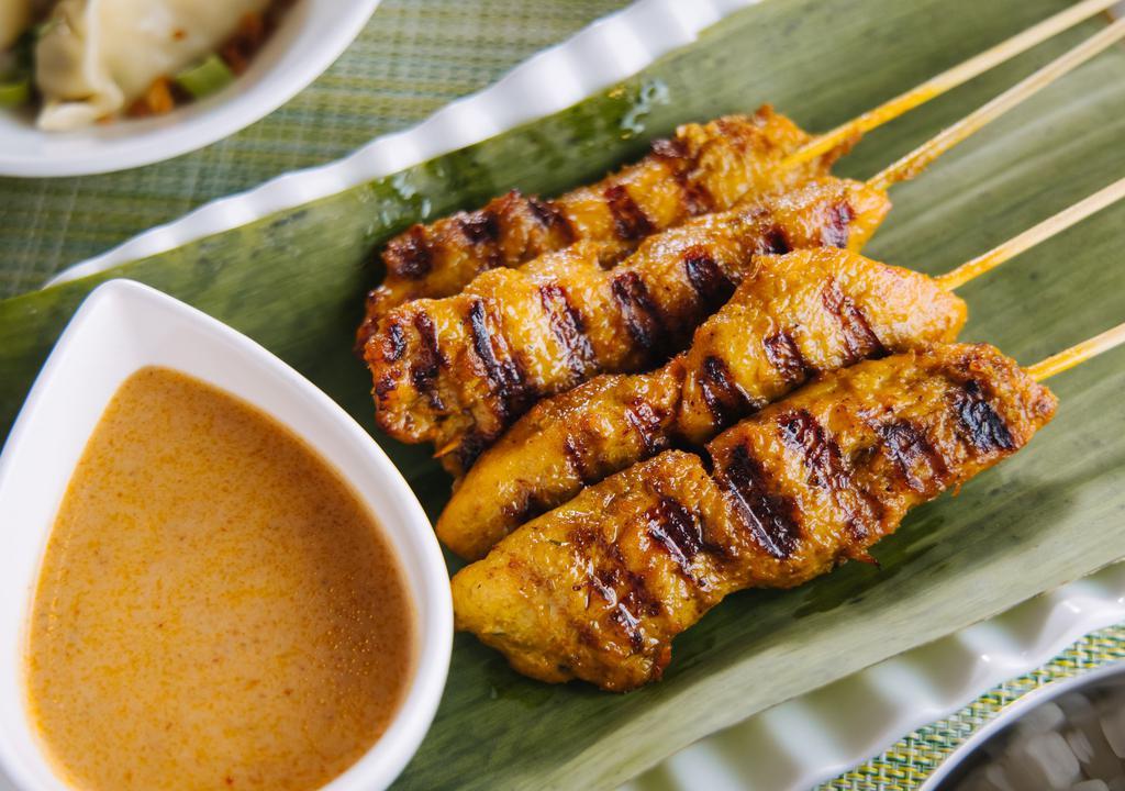 Chicken Satay (4 Pcs) · Grilled tender chicken breast skewered seasoned with our special marinade and served with peanut sauce.