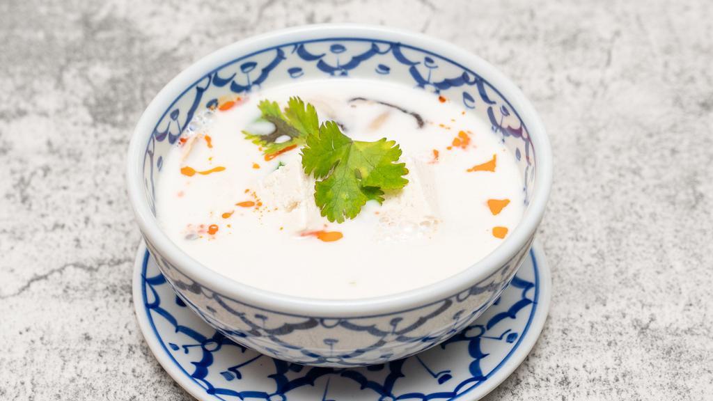 Tom Kha Soup ( Coconut Milk Soup ) · Regular spicy. Coconut milk soup with thai herbs, mushrooms, green onions and fresh lime juice.
