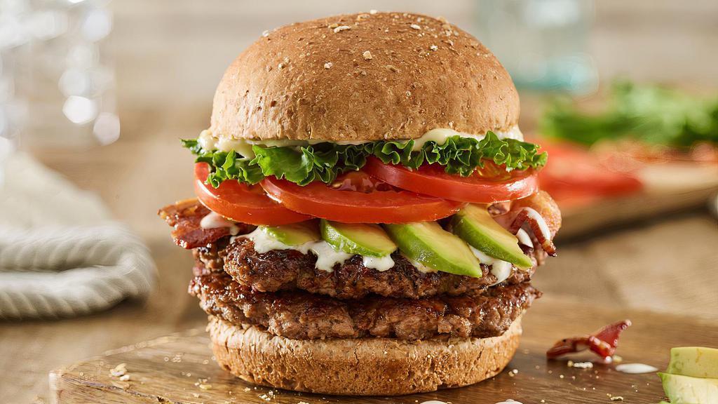Double Avocado Club Burger · Double Certified Angus Beef, sliced avocado, applewood smoked bacon, lettuce, tomatoes, ranch, mayo, toasted multi-grain bun