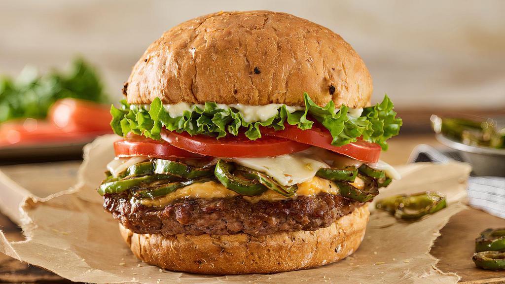 Colorado Single Burger · Certified Angus Beef, pepperjack cheese, melted cheddar, grilled chiles, lettuce, tomato, mayo, on a toasted spicy chipotle bun