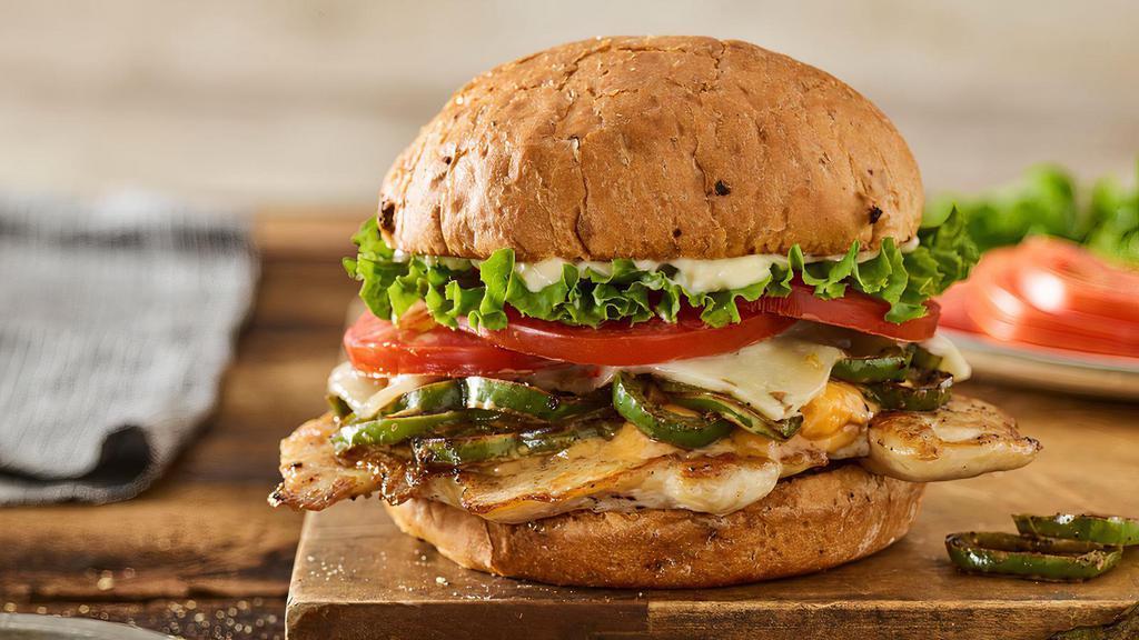 Colorado Grilled Chicken · Grilled chicken breast, pepperjack cheese, melted cheddar, grilled chiles, lettuce, tomato, mayo, on a toasted spicy chipotle bun
