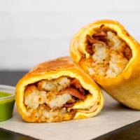Bacon, Egg And Cheddar Burrito · 3 fresh cracked cage-free scrambled eggs, melted Cheddar cheese, smokey bacon, crispy potato...