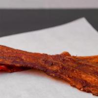 Bacon Side (4 Pieces) · Four pieces of crispy bacon.