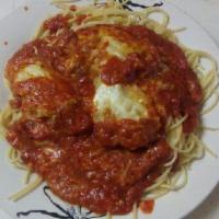 Chicken Parmigiana Pasta · Lightly breaded chicken breast baked with marinara sauce; topped with Mozzarella cheese and ...