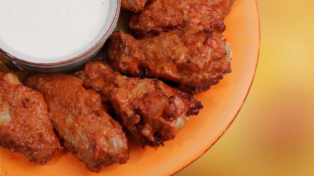 8 Piece Chicken Wings · Each order of our chicken wings include 1 side of Ranch. For an additional side of ranch, please find 'Sides And Dipping Sauce'